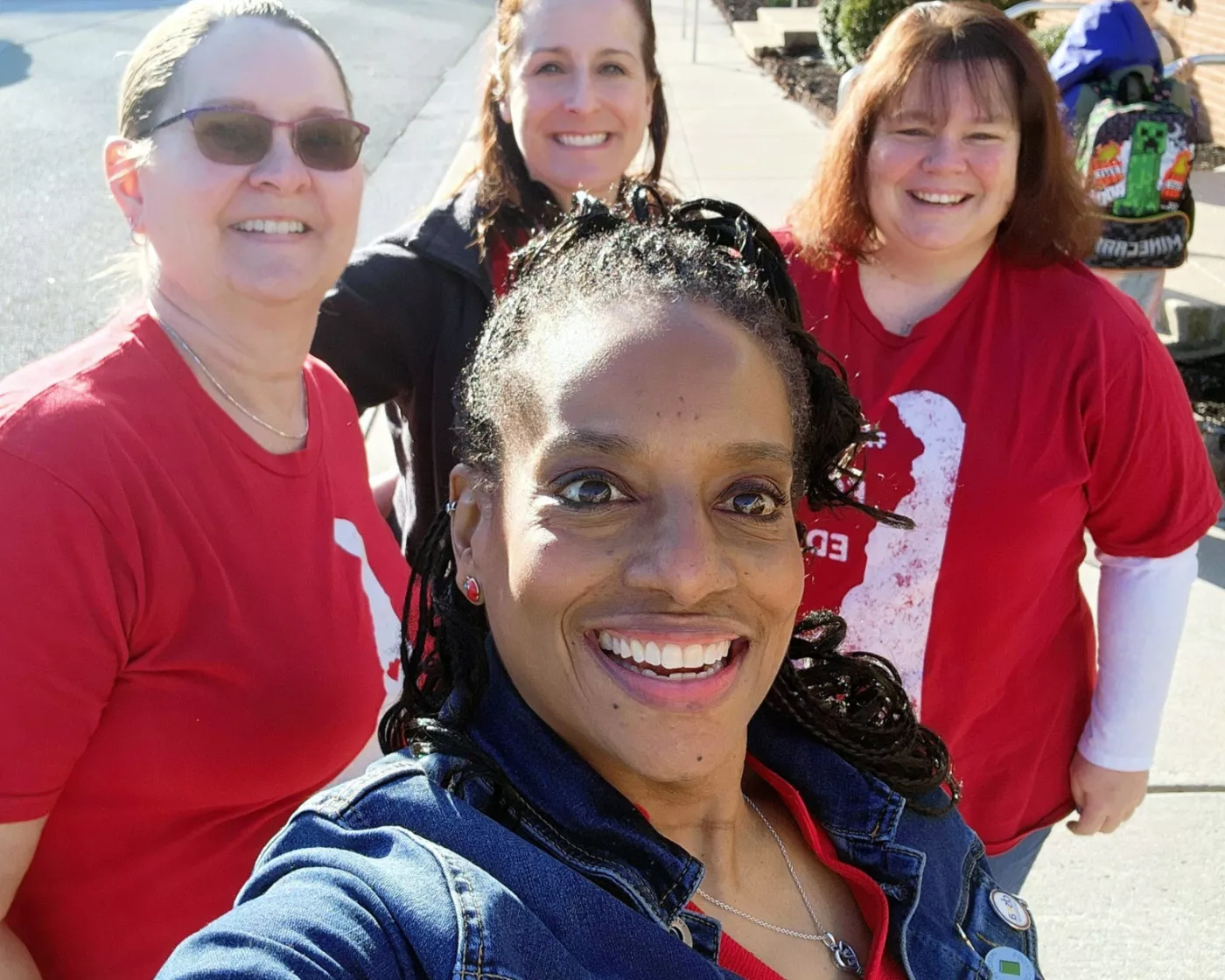 President Ingram poses for a selfie at a March walk-in