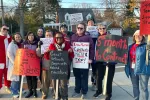 Brandywine Education Association members hold picket signs