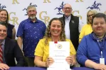 CREA President Jared Lelito and the Caesar Rodney School Board sign a new 4-year contract