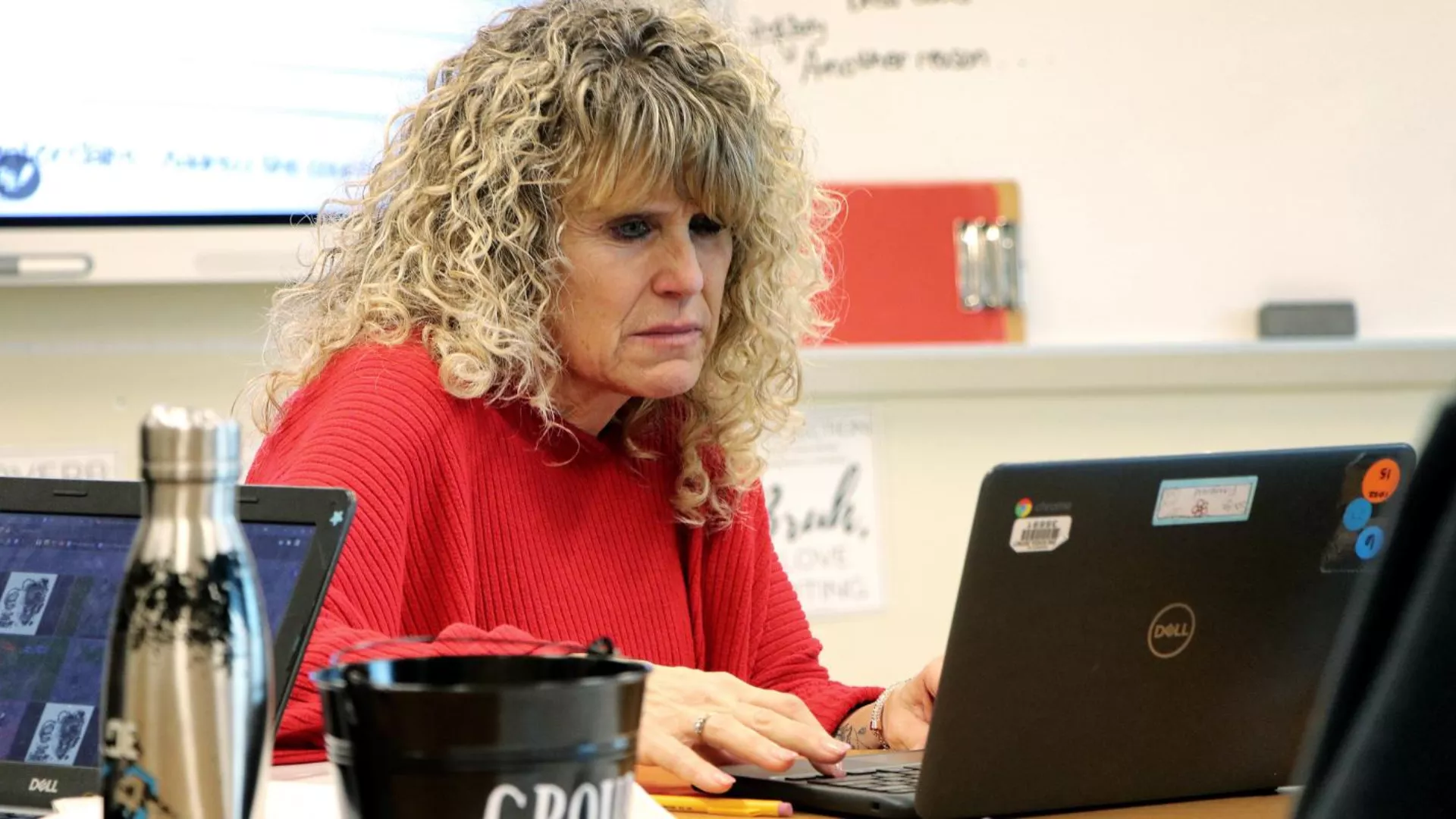 Milford Education Association President Kristin Galati works on her laptop