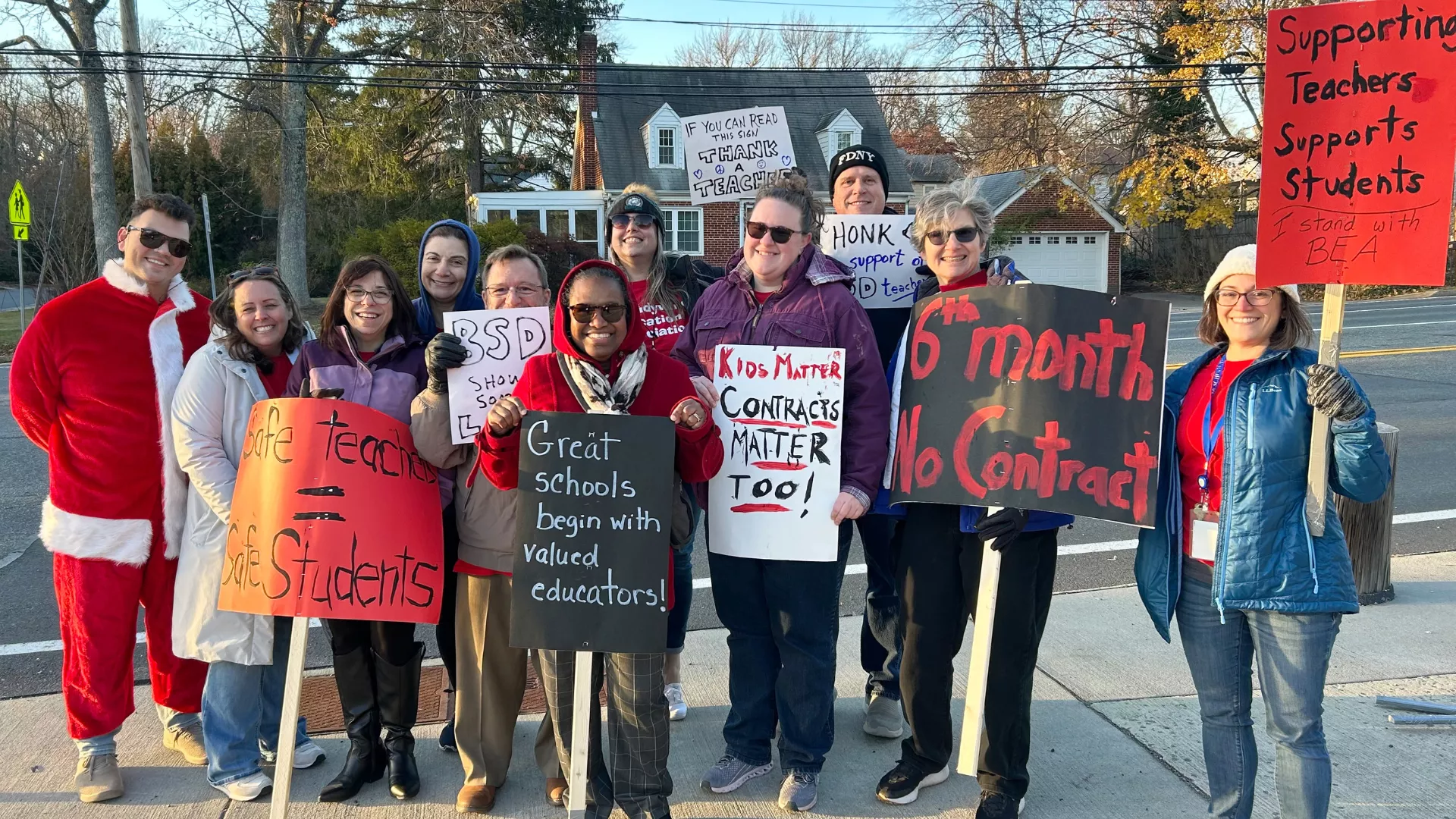 Brandywine Education Association members hold picket signs