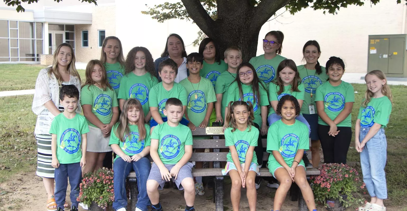 students and teachers posing for a picture