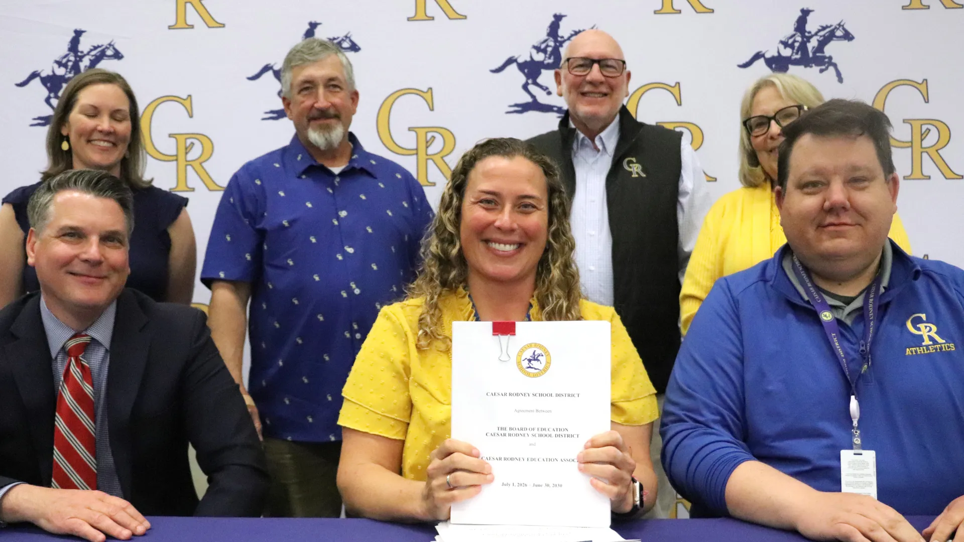 CREA President Jared Lelito and the Caesar Rodney School Board sign a new 4-year contract