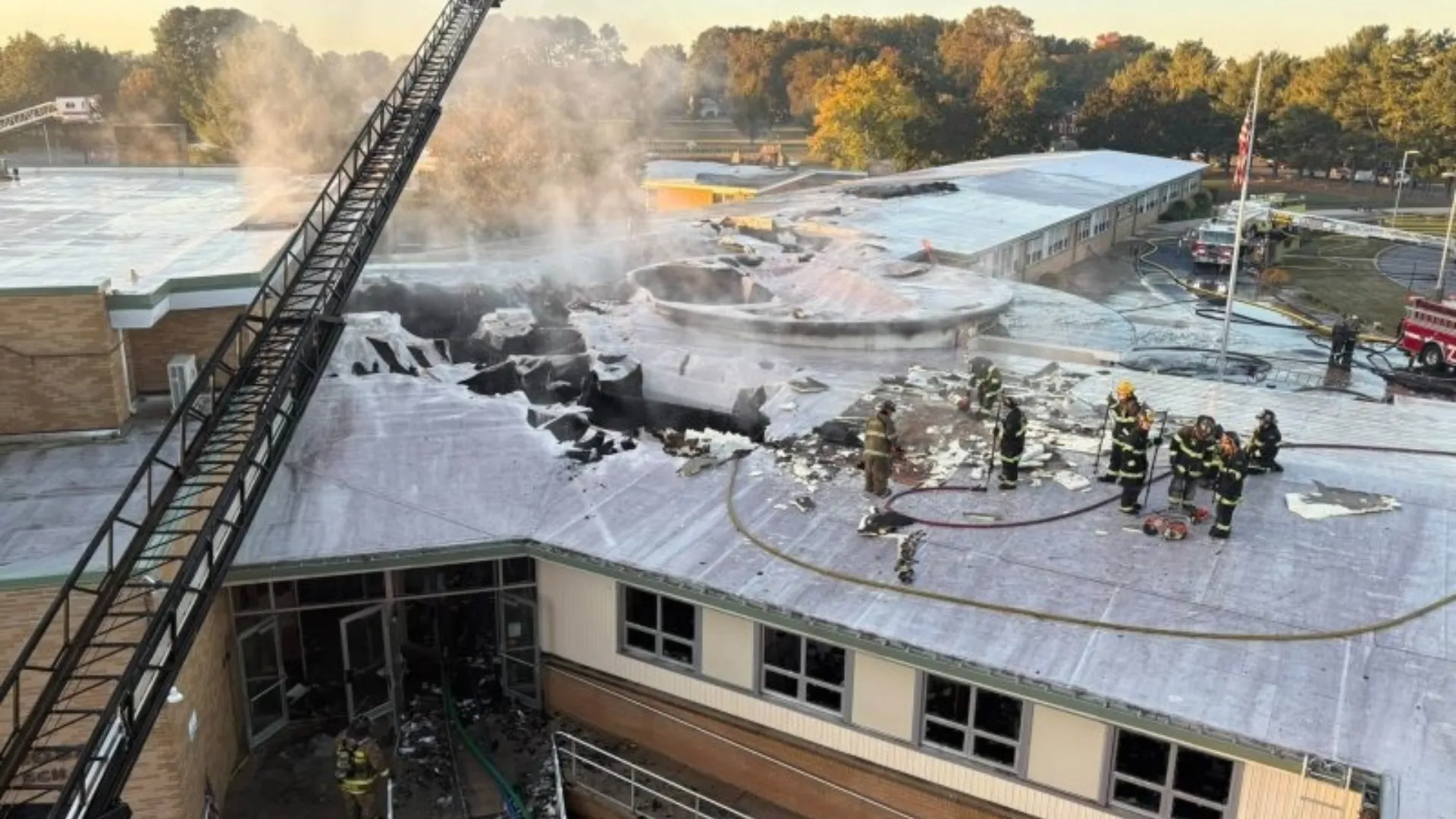 A photo of fire damage on the roof of Lulu M. Ross Elementary School