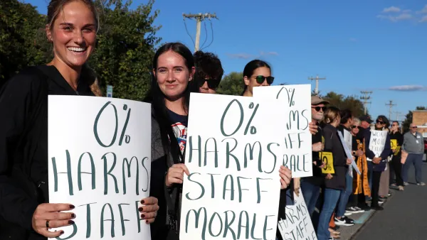 Smyrna educators picket outside of a recent school board meeting