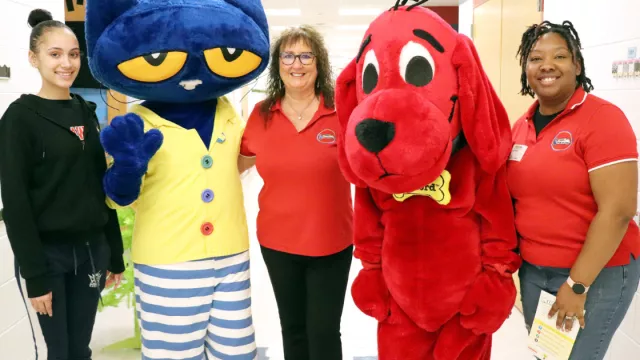 Aspiring Ed members with Pete the Cat and Clifford the Dog